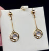 Vintage handmade moonstone earrings from the 1920s, showcasing an elegant Art Deco style with 9ct yellow gold settings.
