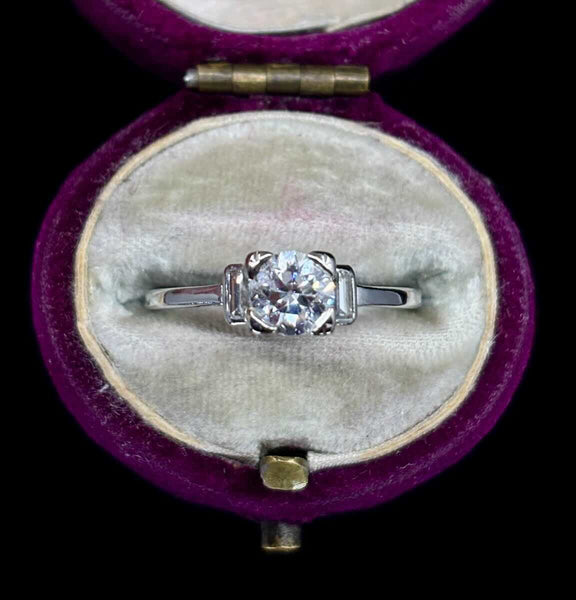 Vintage 1920s Australian Hardy Brothers platinum engagement ring with diamonds.