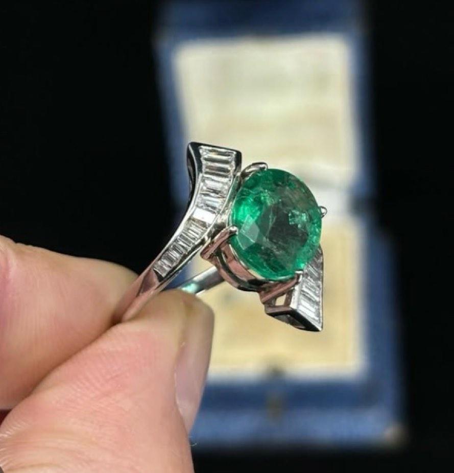 Vintage inspired ring featuring a 3.25 carat untreated emerald with diamonds