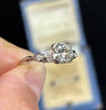 Side view of the vintage Australian 1940s diamond engagement ring featuring the elegant feminine setting.