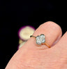 A unique and collectible quatrefoil diamond ring, perfect for lovers of antique and vintage jewelry.