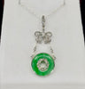 A‑type jadeite pendant in platinum, untreated natural jadeite pi disc set with rose‑cut diamonds — circa 1900