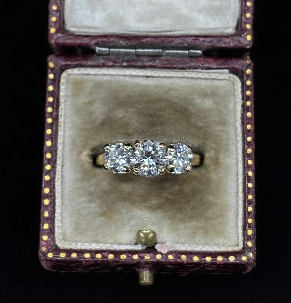 Anniversary gift diamond trilogy ring in 18ct yellow gold.