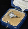 Antique 1920s Old European Cut Diamond Cluster Ring showcasing intricate design and vintage charm.