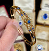 Antique Australian sapphire and diamond gold bangle by Duggin Shappere, 1895 Victorian hinged design.
