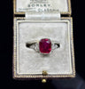 Antique cushion ruby ring in 18ct white gold and platinum, rich deep red 2.83ct ruby of Thai origin (GSL certified) with decorative gallery and shoulders.