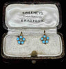 Pair of antique daisy cluster earrings with turquoise and pearls in an antique earring box.