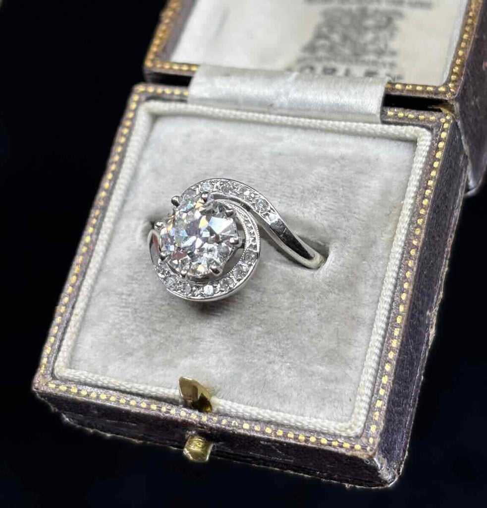 Antique engagement ring featuring a 1.80ct Old European cut diamond, VS2 clarity and I colour, handmade 18ct white gold setting, Art Deco crossover design
