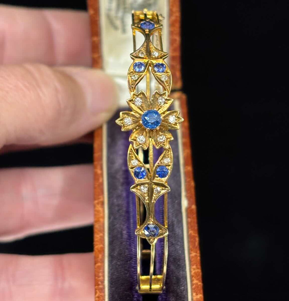 Antique gold bangle with cornflower-blue sapphires and old-cut diamonds, Victorian Australian jewellery.