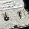 Antique daisy cluster earring turned to show the hinged lever-back fitting