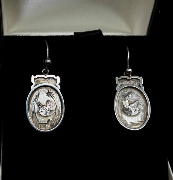 Antique Victorian earrings with hand-engraved chinoiserie designs in sterling silver.