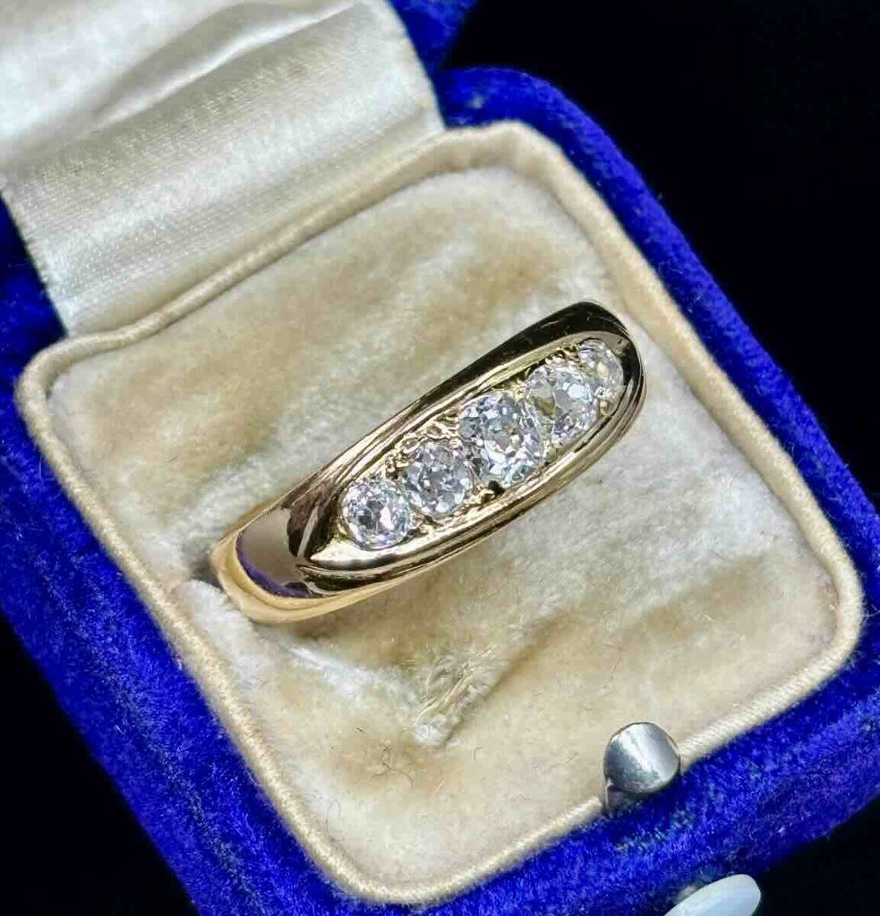 Side view of antique Victorian half hoop diamond ring