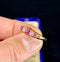 Antique Victorian half hoop ring featuring pink sapphires and diamonds in 18ct yellow gold.