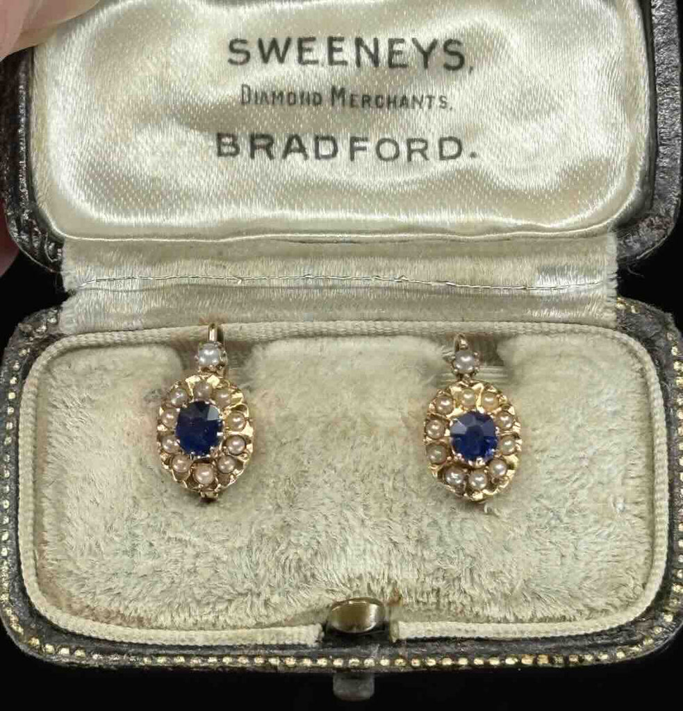 Antique Victorian sapphire and pearl earrings circa 1880 in 18ct yellow gold with royal blue 0.28ct sapphires and natural seed pearl halo.