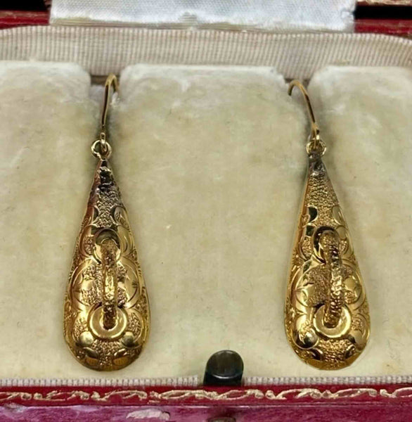 Pair of antique Victorian yellow gold earrings circa 1870 shown in full length