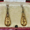Pair of antique Victorian yellow gold earrings circa 1870 shown in full length