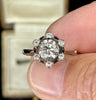 Art Deco diamond cluster ring by Alabaster & Wilson with black enamel accents.