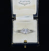 Art Deco diamond engagement ring emphasizing 1920s craftsmanship.