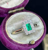 Art Deco rectangular cluster engagement ring, geometric design.