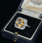 Art Deco imperial topaz ring with a stunning yellow gemstone and diamond accents.