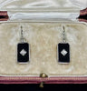 rt Deco onyx and round brilliant diamond drop earrings in 9ct white gold, 23mm long, rotated square setting with milgrain.