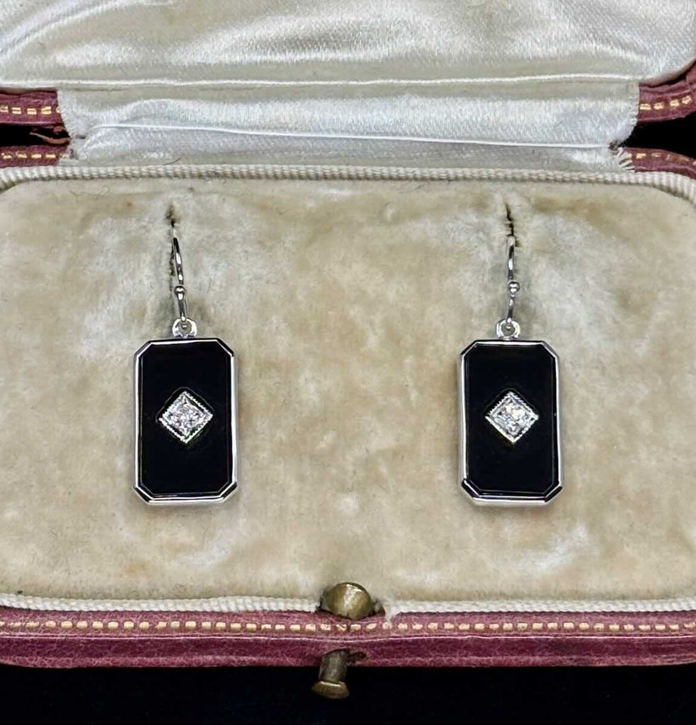 rt Deco onyx and round brilliant diamond drop earrings in 9ct white gold, 23mm long, rotated square setting with milgrain.
