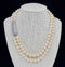 Art Deco 1920s double-strand pearl necklace with diamond clasp.