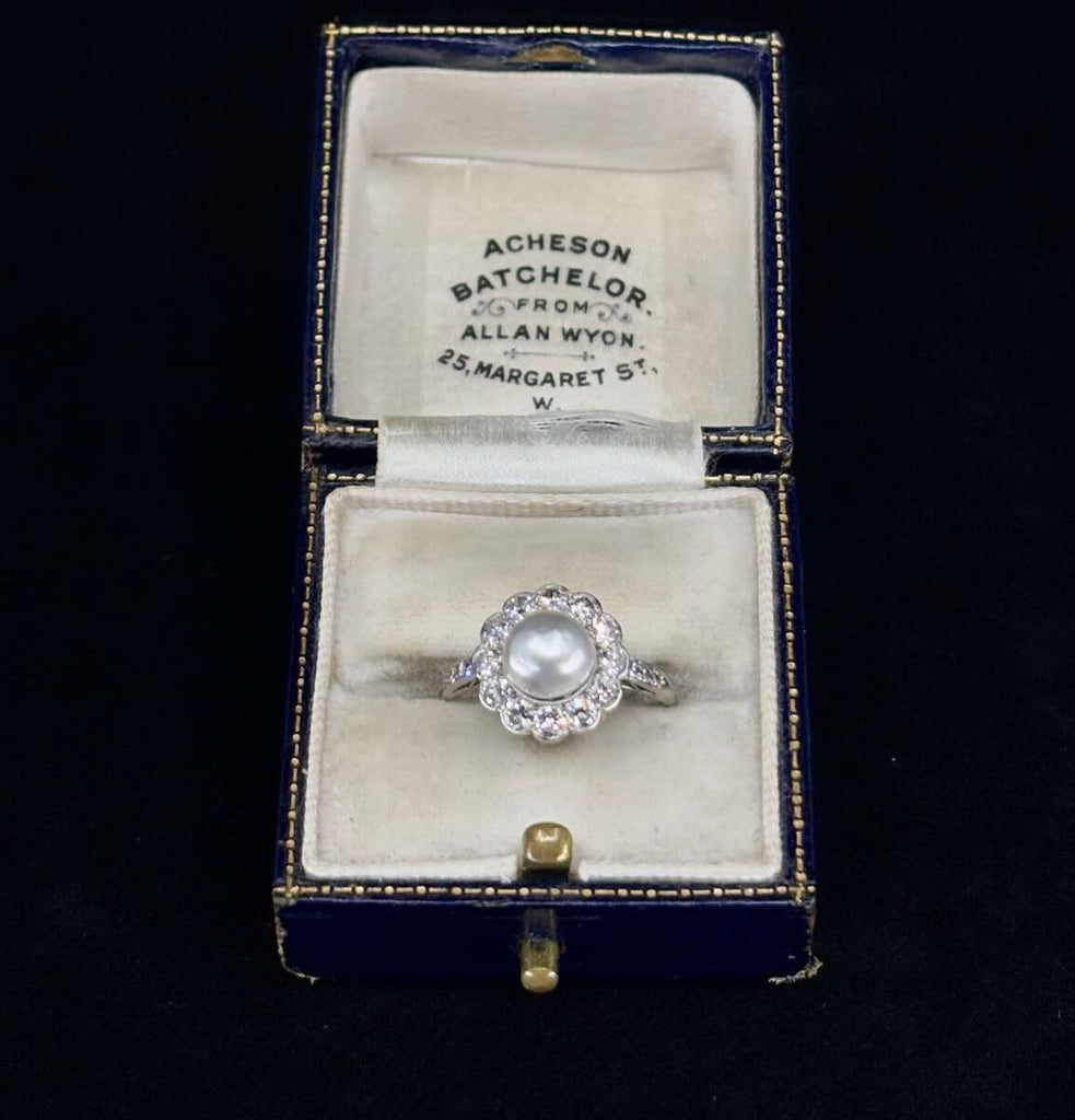 Australian antique pearl and diamond cluster ring, near‑round natural pearl surrounded by early modern diamonds.