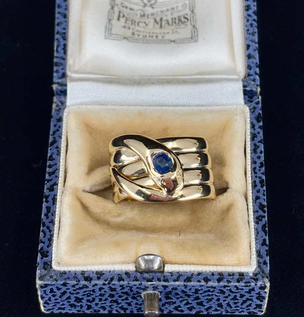 Beautiful Victorian snake ring with cushion cut sapphire and diamond eyes, crafted in 18ct yellow gold, marked Birmingham 1899 by Norris Bros.