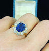 Ceylon_Sapphire_and_Diamond_Oval_Cluster_Ring