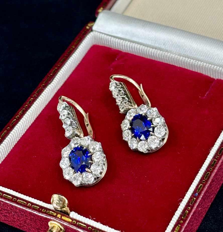 Antique cluster earrings with vivid Ceylon sapphires and old mine cut diamonds, made in Vienna during the Austro-Hungarian Empire.
