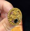 Heritage colonial Australian jewellery brooch featuring deep green sapphire set in claw with grape leaf decoration by Lamborn and Wagner