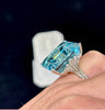 50-carat emerald cut aquamarine ring set in platinum with diamond shoulders