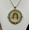 Signed Duggin, Shappere & Co. 15ct gold Victorian locket pendant featuring a painted child’s portrait, turquoise halo and pearl accents.