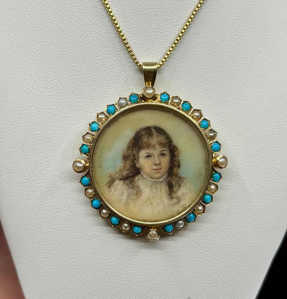 Signed Duggin, Shappere & Co. 15ct gold Victorian locket pendant featuring a painted child’s portrait, turquoise halo and pearl accents.