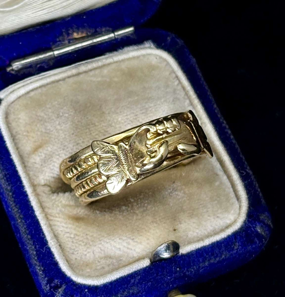 Early Victorian fede gimmel ring displayed in antique jewellery box