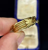 Side profile of early Victorian fede gimmel ring showing interlocking multi band design in gold