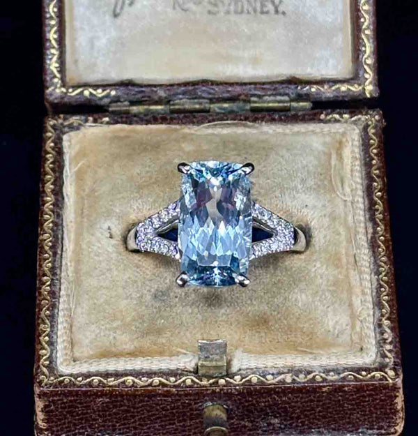 Elegant aquamarine ring set in 9ct white gold with diamond shoulders.