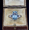 Elegant aquamarine ring set in 9ct white gold with diamond shoulders.
