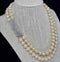 Elegant Art Deco pearl necklace with a detailed diamond clasp from the 1920s.