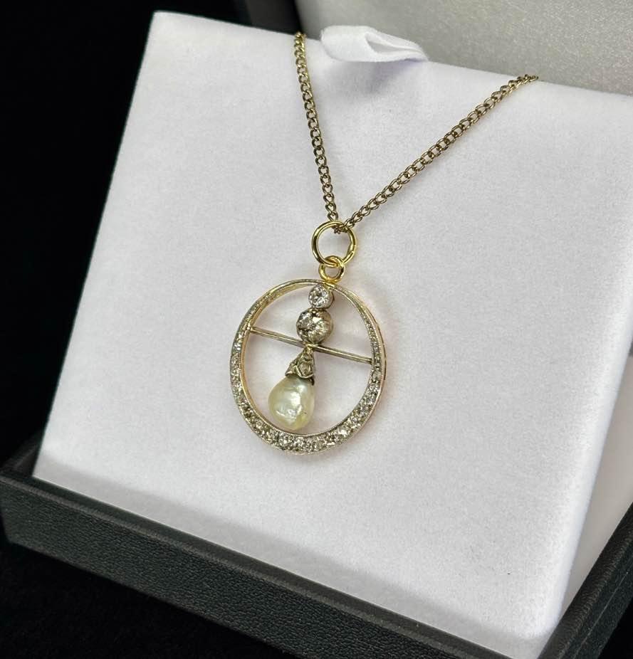 Elegant wedding jewellery pendant with natural pearl and diamonds, perfect for brides seeking timeless accessories for their special day.