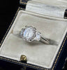GIA certified 1.51ct emerald cut engagement ring in platinum, E colour VS2, Art Deco baguette side stones