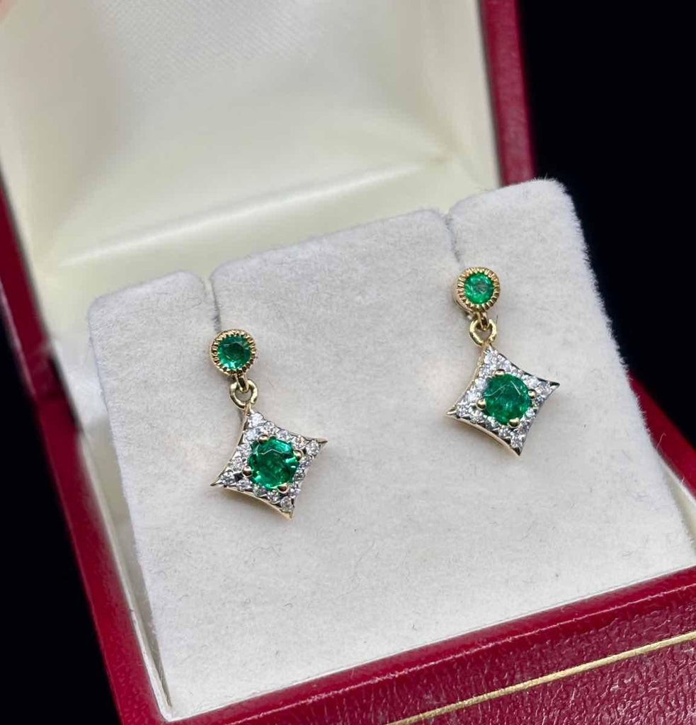 Modern emerald and diamond earrings in 9ct yellow gold.