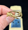 Georgian gold fede gimmel rings separated to reveal the unclasped hands and single gold bands.