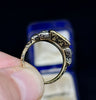 Interior view of Georgian ring band with engraved shoulders and enamel work