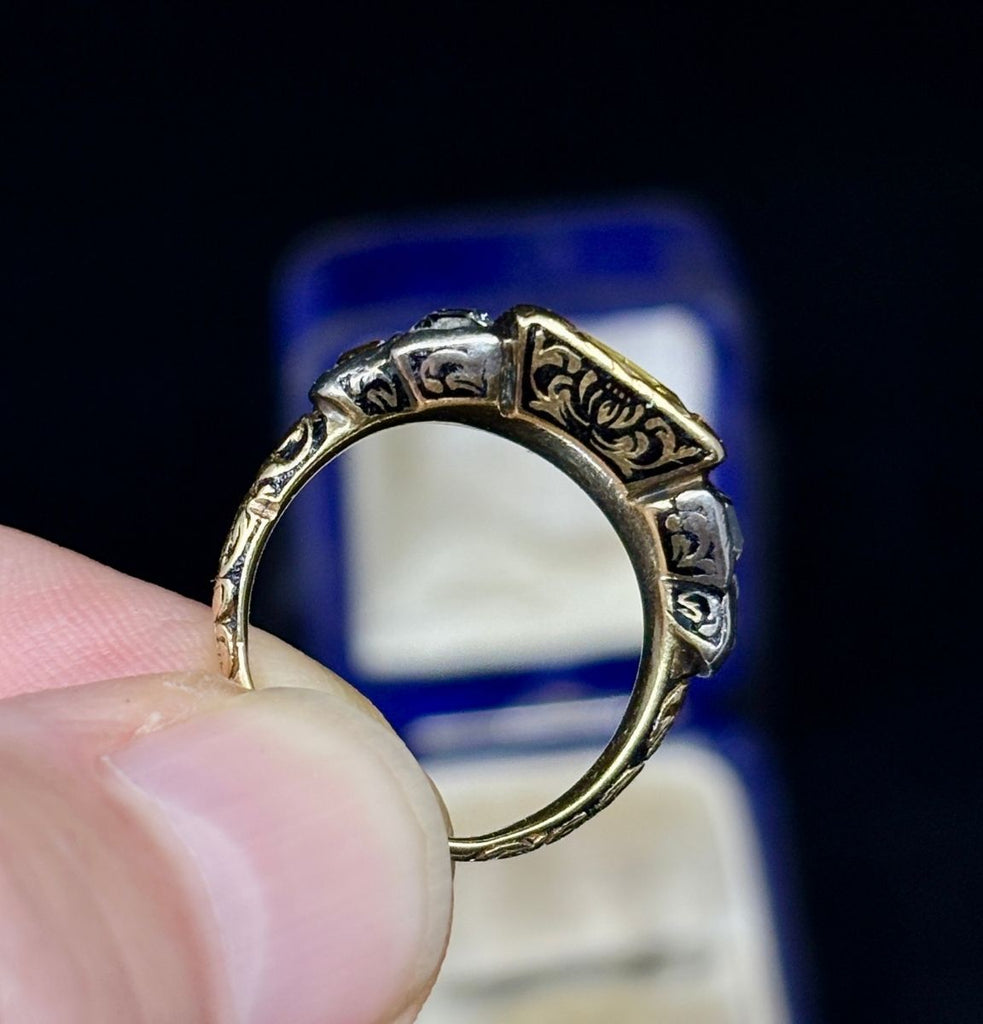 Interior view of Georgian ring band with engraved shoulders and enamel work