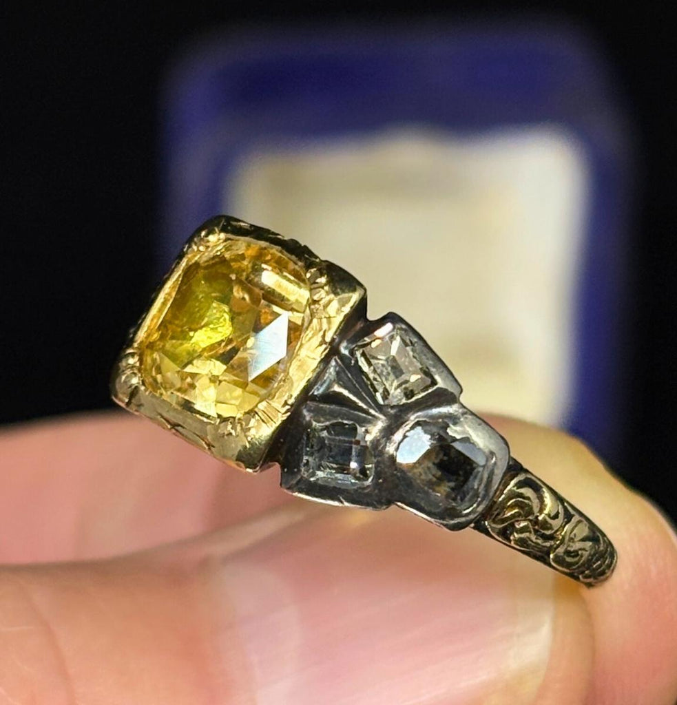 Side profile of Georgian yellow topaz ring showing black enamel gallery