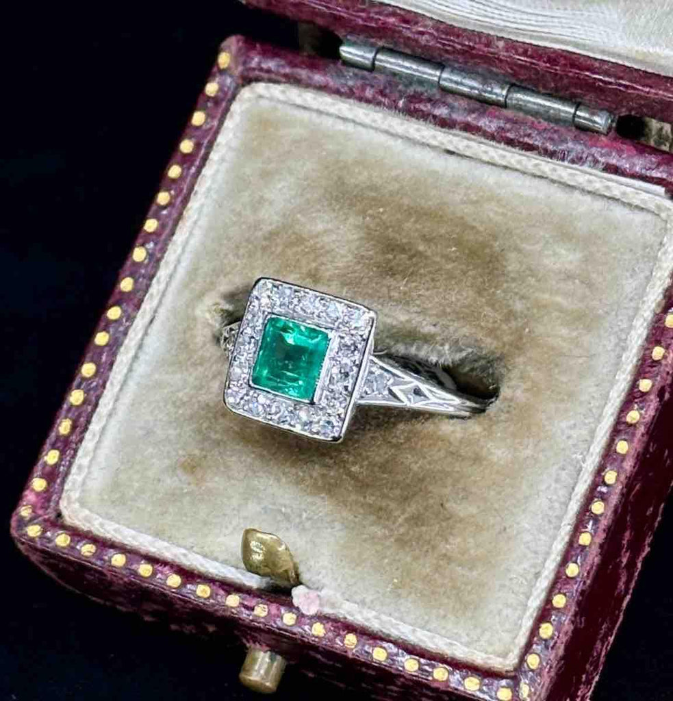 Handmade 1950s emerald cluster ring featuring exquisite craftsmanship.