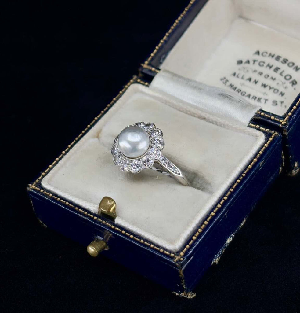 Hardy Brothers 1920s platinum pearl and diamond petal cluster ring, X‑ray confirmed natural pearl.