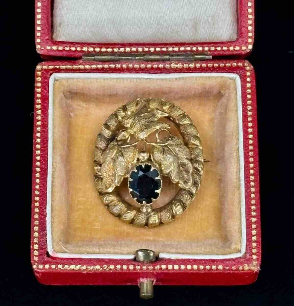  Close-up of Lamborn and Wagner dove motif on a colonial Australian brooch in 15ct yellow gold with rope frame